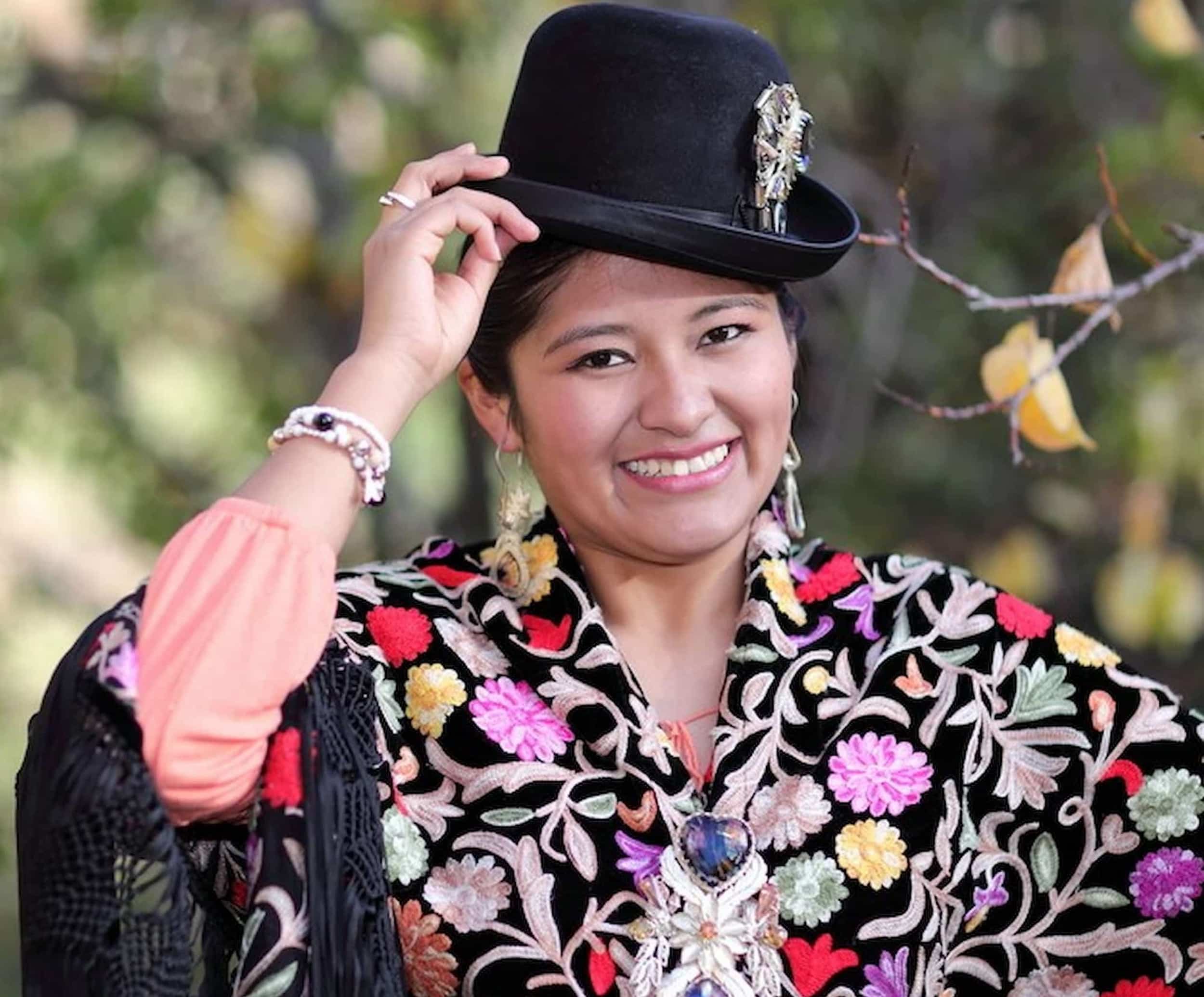 Cholita woman wearing the traditional styled Polleras. Cholita woman wearing the traditional styled Polleras.