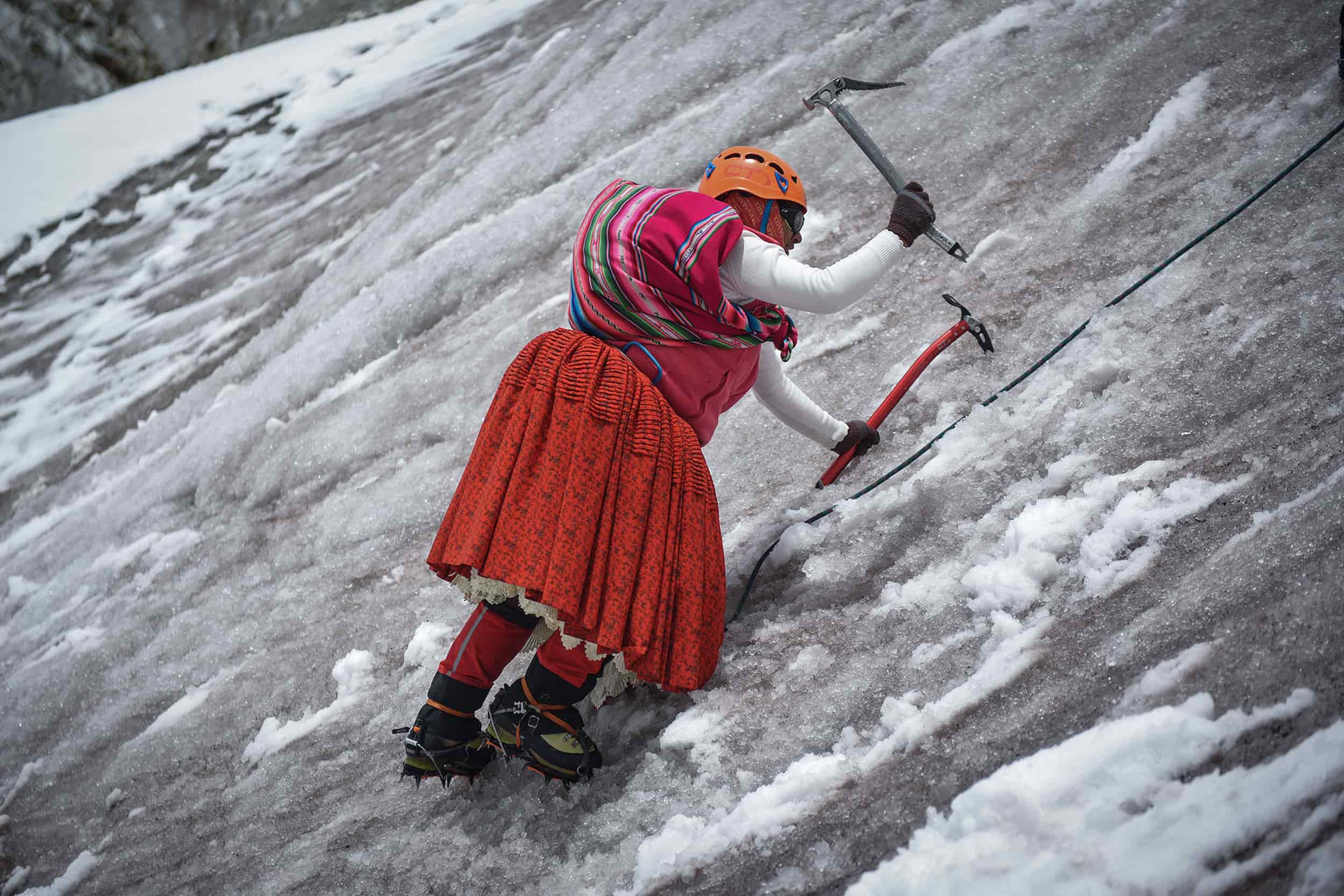Cholita's Escaladoras climbing the mountain of Bolivia. Cholita's Escaladoras climbing the mountain of Bolivia.