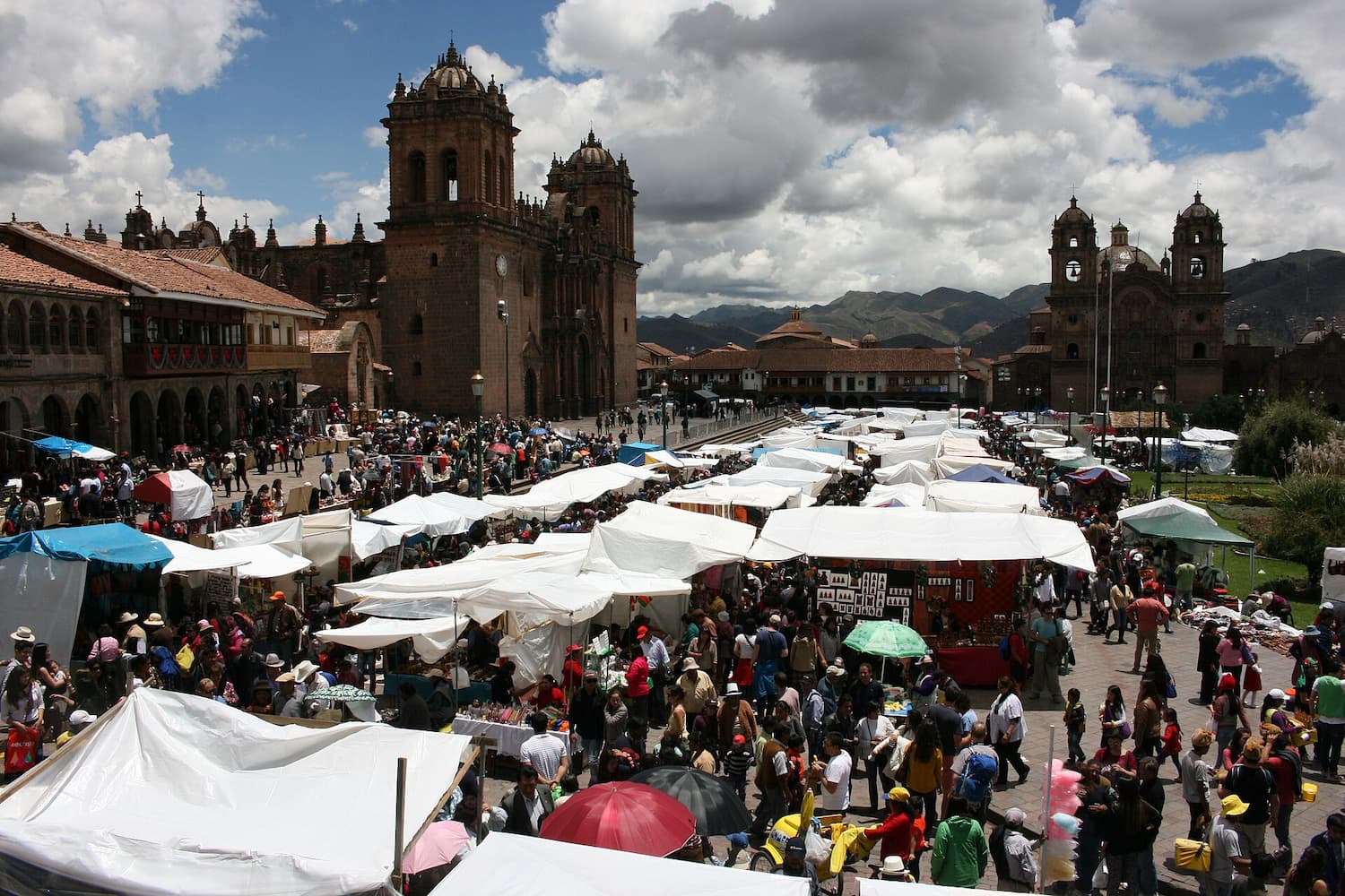 Traditional craft market stalls in Plaza de Armas, Cusco, Peru at Christmas