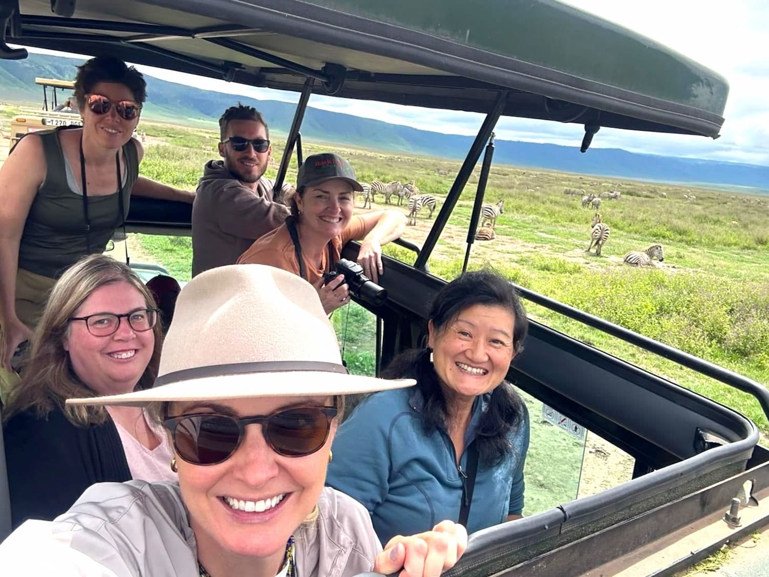 Tara and other guests on thrilling game drive adventures
