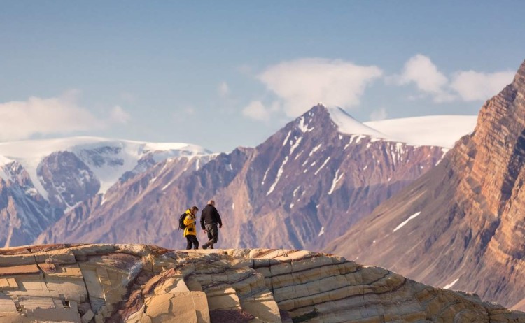 QuarkExpeditions pax in landscape skipperdal kong oscar fjord east greenland Credit AcaciaJohnson
