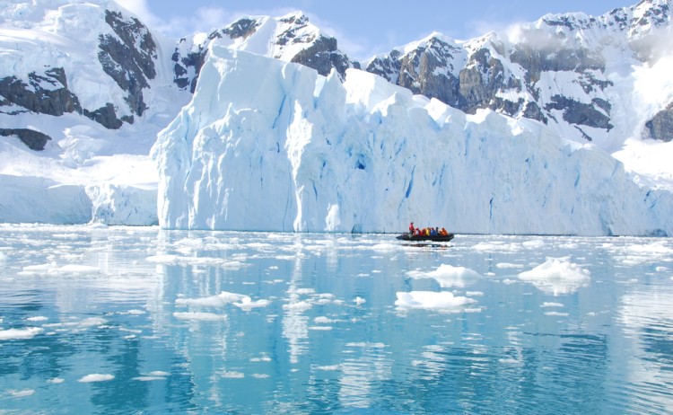 antarctica zodiac cruising with icebergs