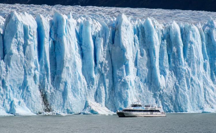 El Calafate tours close up of towering Perito Moreno Glacier during boat tour