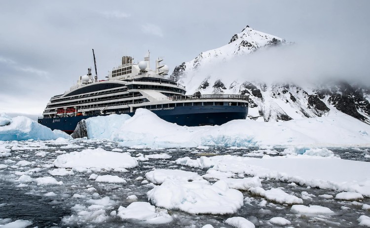 Emperor penguins of the Weddlell Sea Le Commandant vessel in Antarctica