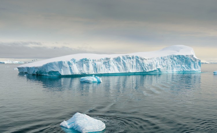 Exploring Antarcticas Spring floating massive iceberg