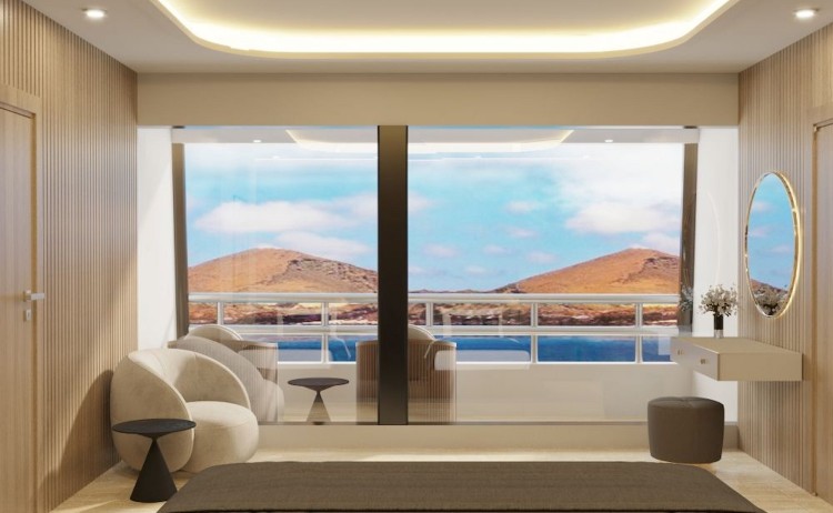 Hermes king bed suite and balcony