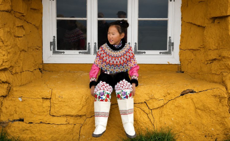 Heart of the Arctic girl in traditional costume in Greenland