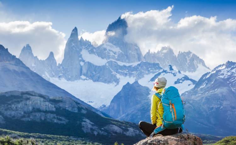 Hike in El Chalten hiker gazing Mt FitzRoy