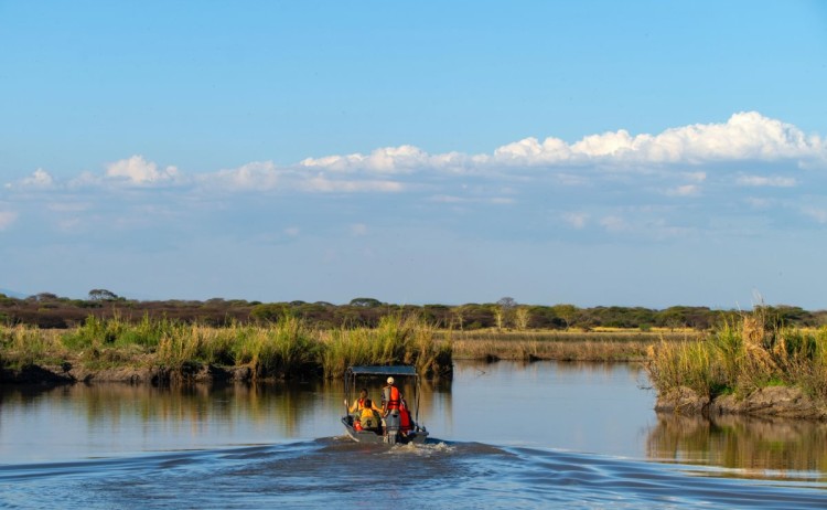 Mara to Wild South Usangu Expedition Camp Asilia boat river cruise
