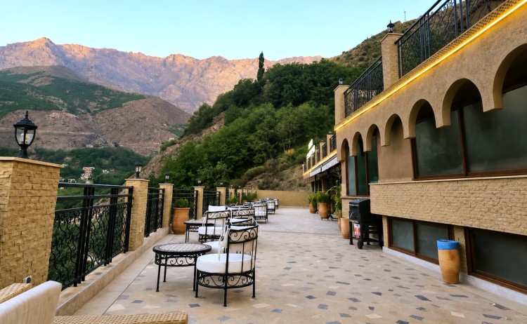 Mount Toubkal Summit TrekRefuge Le Mouflons terrace overlooking the rugged peaks of the High Atlas Mountain