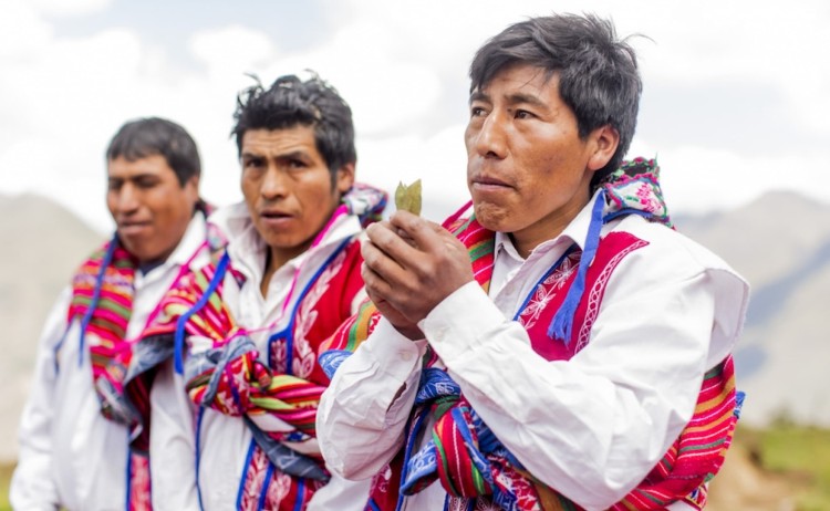 Mountain lodges of Peru peruvian men in their traditional Andean attire