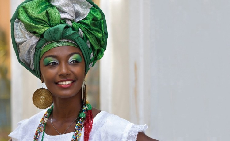 Northern Brazil Experience woman with vibrant head dress and accesory