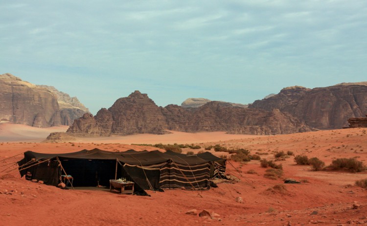 Bedouin tent camp in the desert of Wadi Rum small shutterstock 1878555343