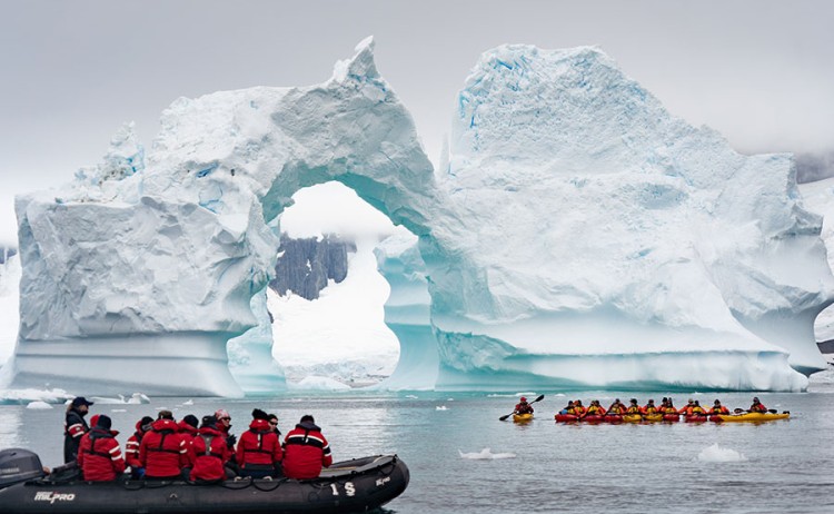 Ultimate Antarctic circle crossing, zodiac and kayakers