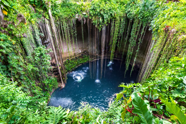 Cenote archaeological sites and dreamy beaches these are the calling cards of Mexicos Yucatan Peninsula