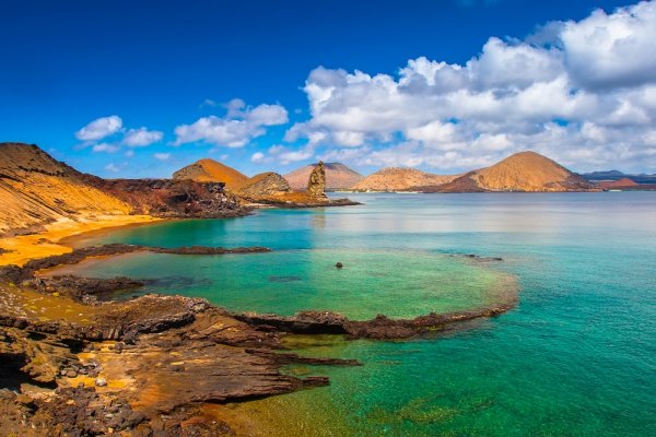 Volcanic landscape on Bartolome Island on the coast