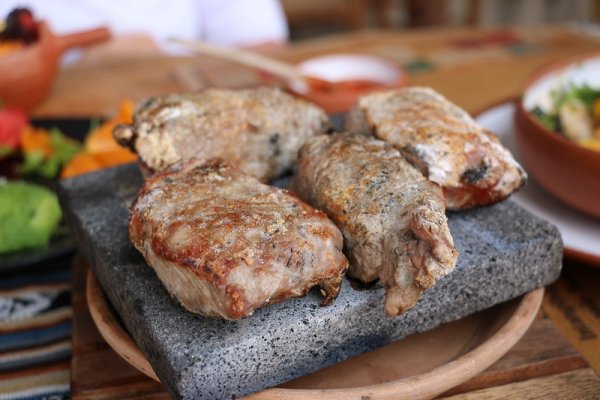 Alpaca tenderloin roasted on hot stone