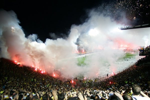 Flares at the La Bombonera Stadium