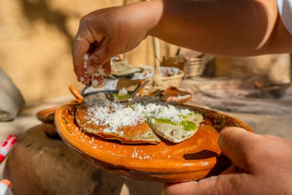 best food in Mexico corn tlacoyo with beans and salsa