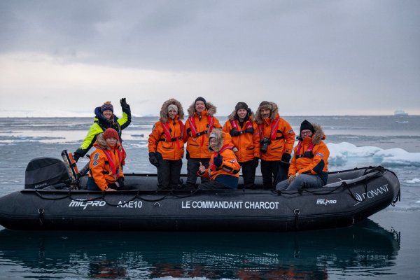 Group of people on a zodiac boat