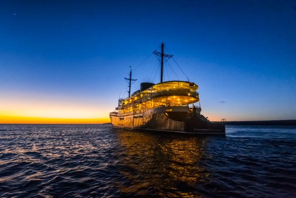 Evolution cruise ship at night