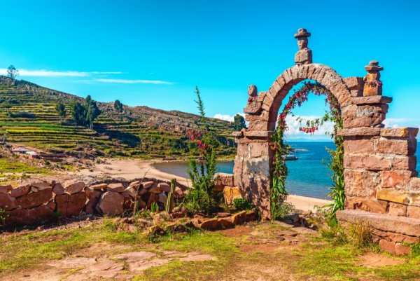 Entrance stone arch leading to the interior of Taquile Island in Lake Titicaca, 