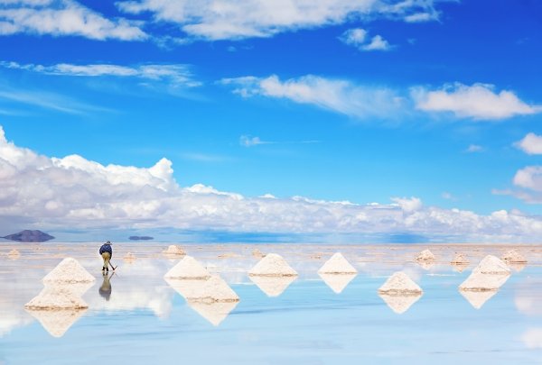 Working man in Salt Flats, Bolivia