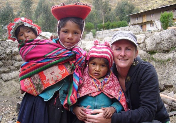 Rachel with a group of local children