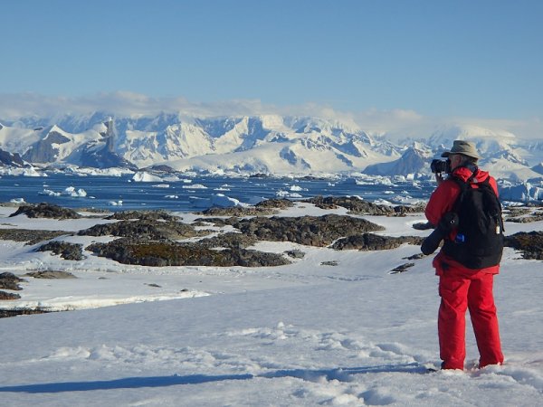 A man taking pictures of Antarctica