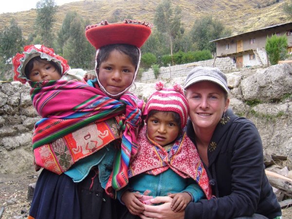 Rachel with a group of local children