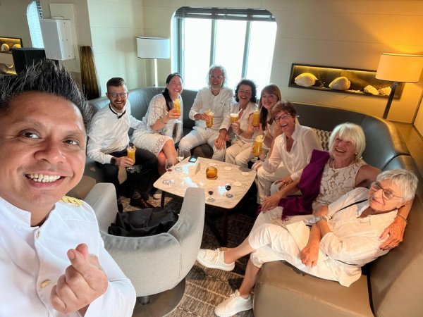 Group of guests enjoying white night onboard L'Austral