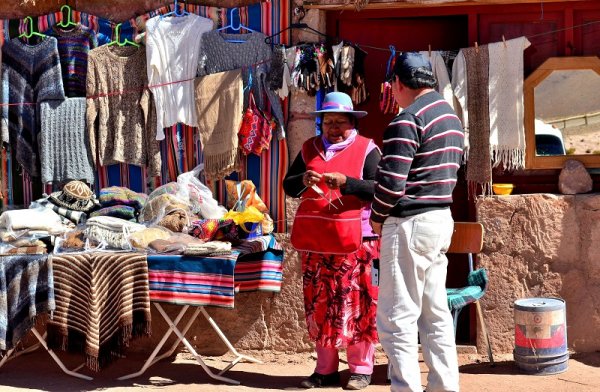 Tourist buying in the local market in Chile