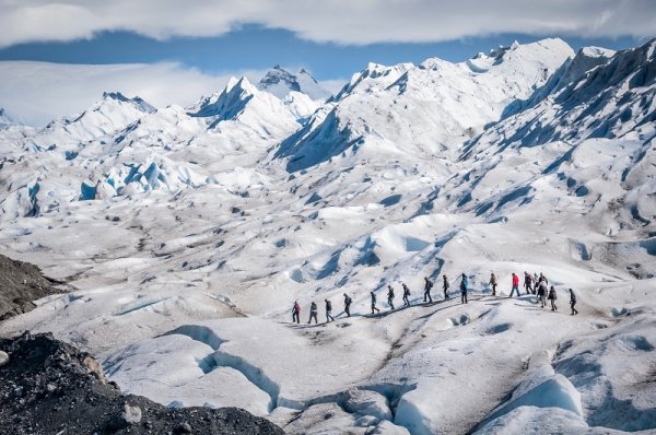 Tourists trekking on Perito Moreno Glacier, El Calafate, Patagonia