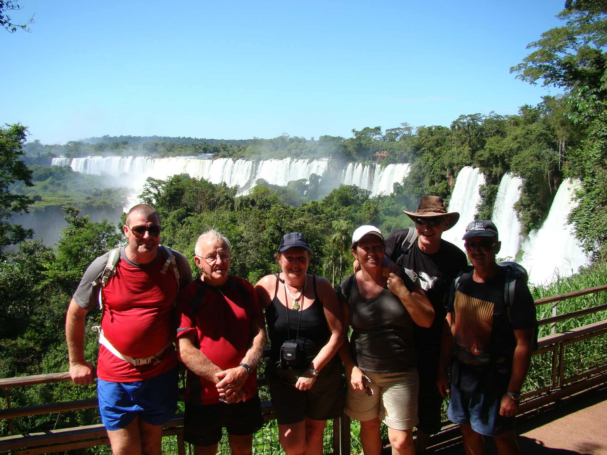 Viva Expeditions group at a scenic viewpoint at Iguazu Falls.