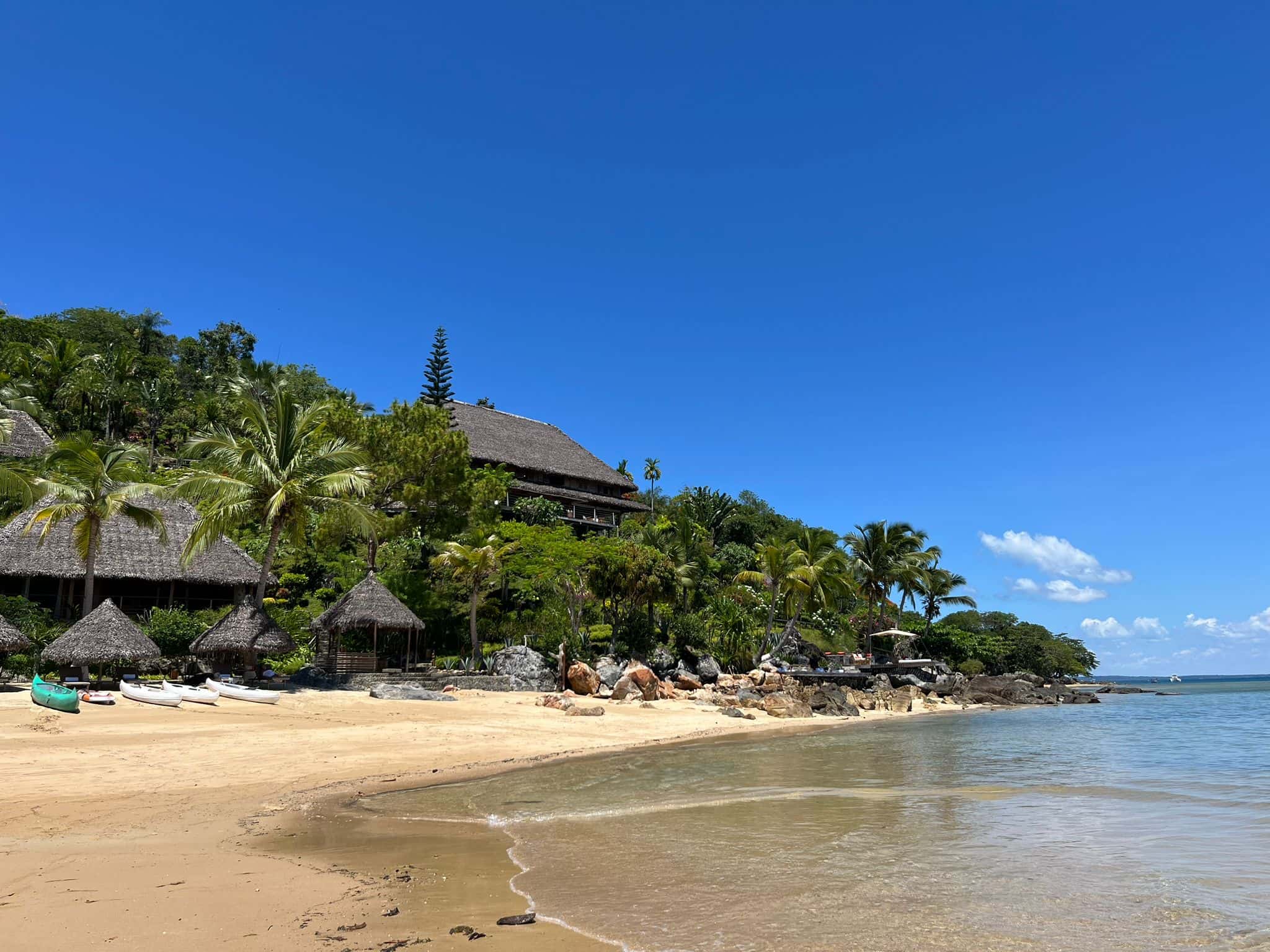 Beach resort among palm trees in Nosy Komba, Madagascar