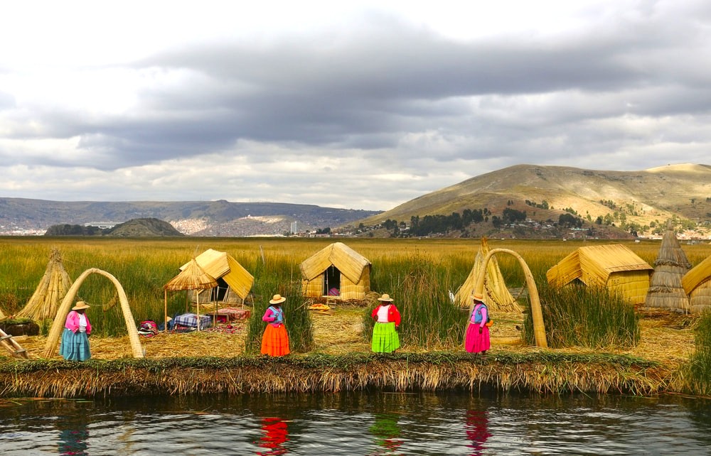 Uros people of Lake Titicaca, Peru. Uros people of Lake Titicaca, Peru.