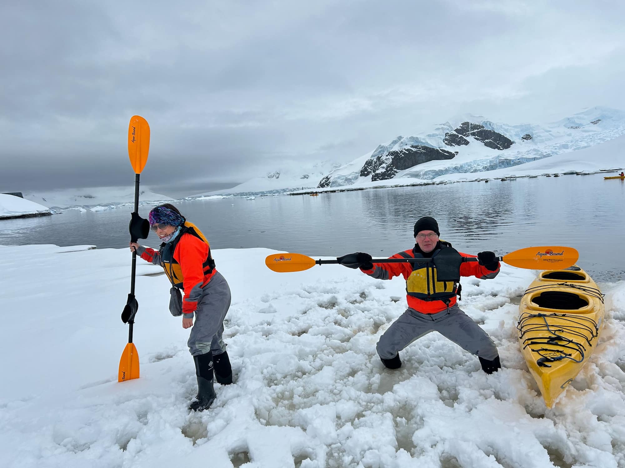 Expedition cruise ship passengers preparing for a kayaking outing in Antarctica