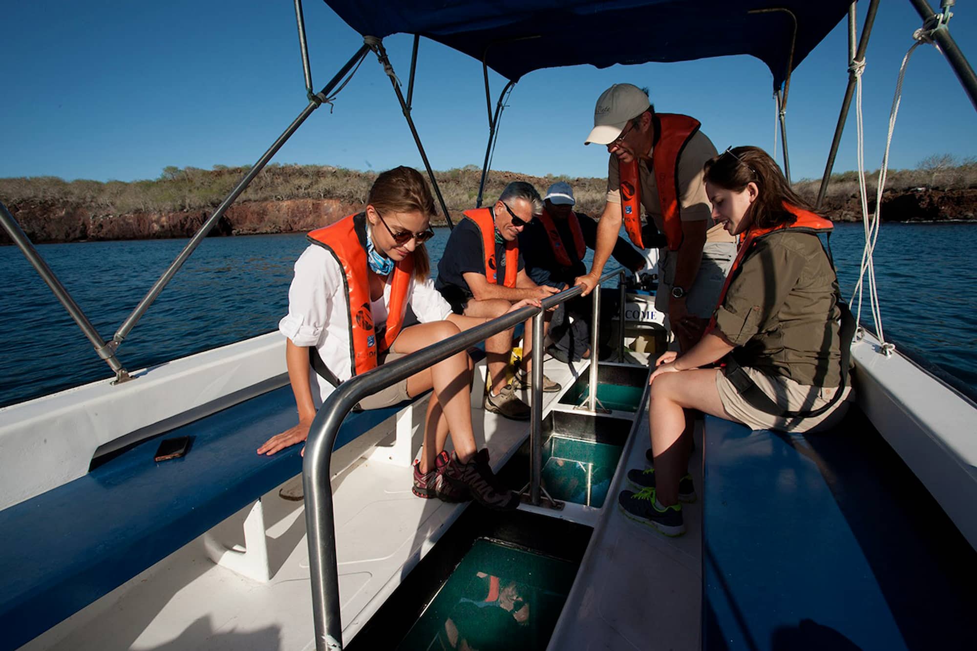 Guest on a glass-bottom boat in the Galápagos