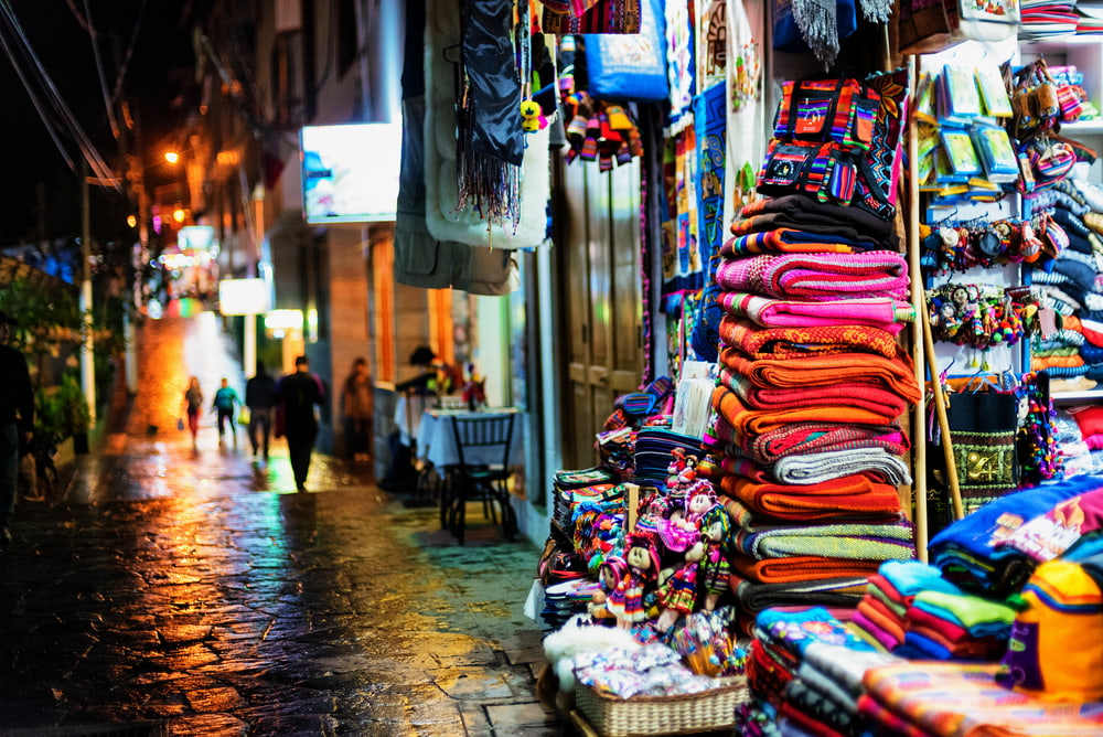 Quaint storefronts and cafés in Aguas Calientes, the main base for visitors to Machu Picchu. Quaint storefronts and cafés in Aguas Calientes, the main base for visitors to Machu Picchu.