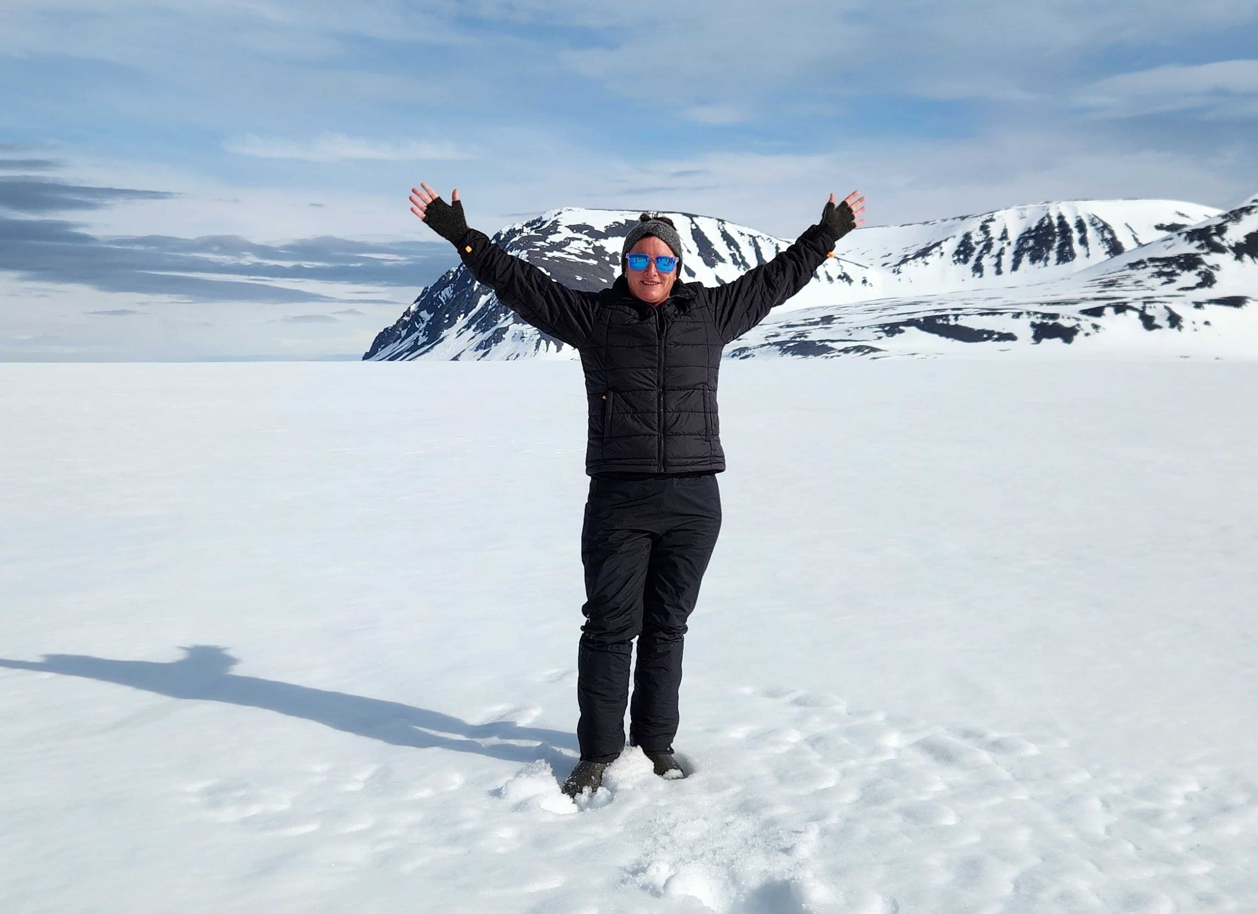  A photo of Rach, founder of Viva showing what 10:30PM looks like in Arctic.