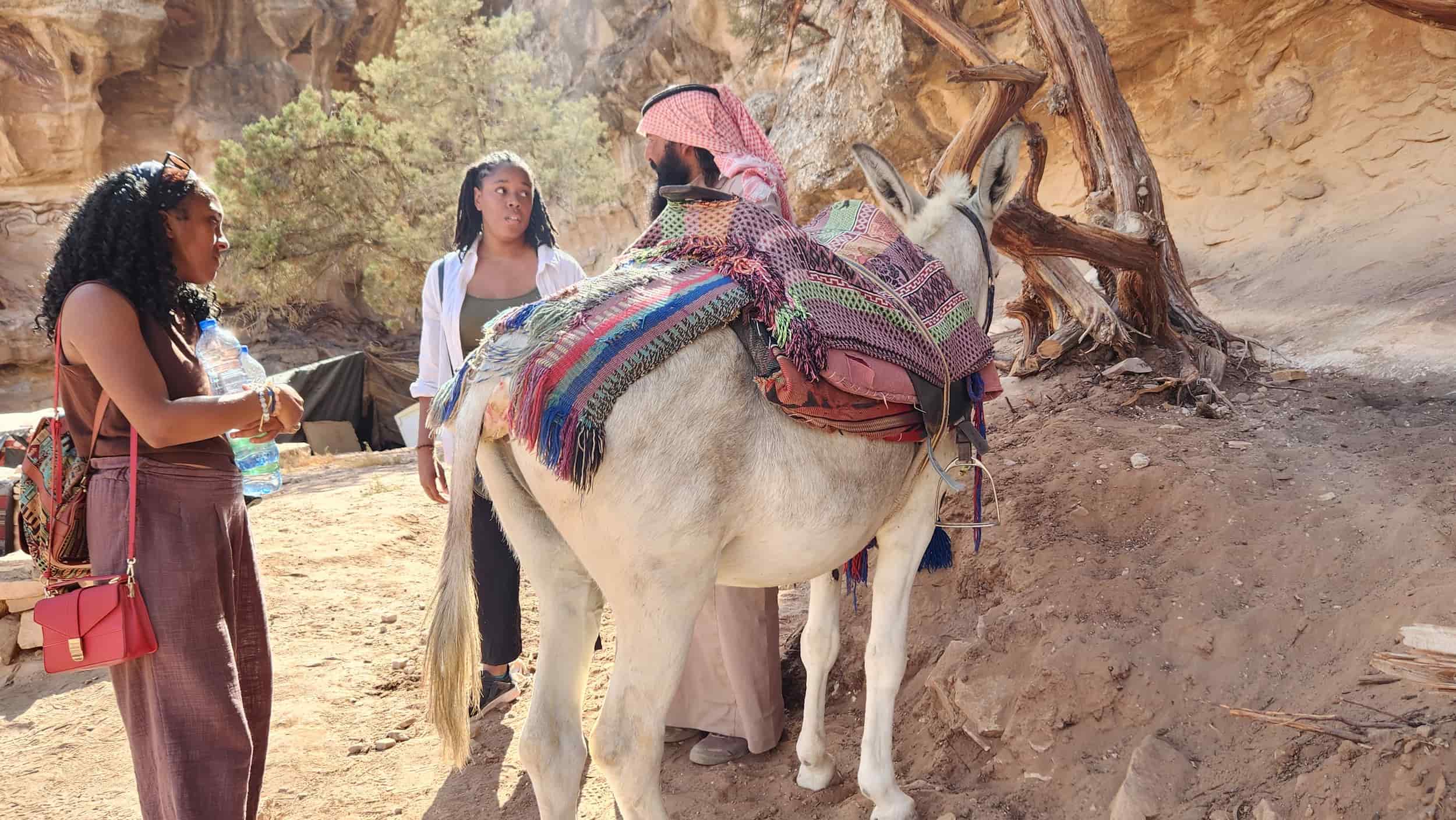 Women travelers interacting with the local. 