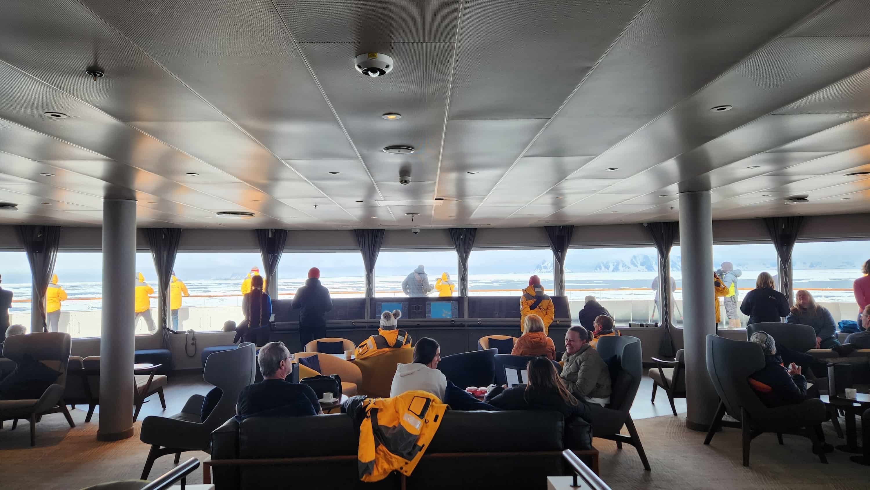 Ultramarine’s observation lounge with panoramic windows and binoculars for guests.